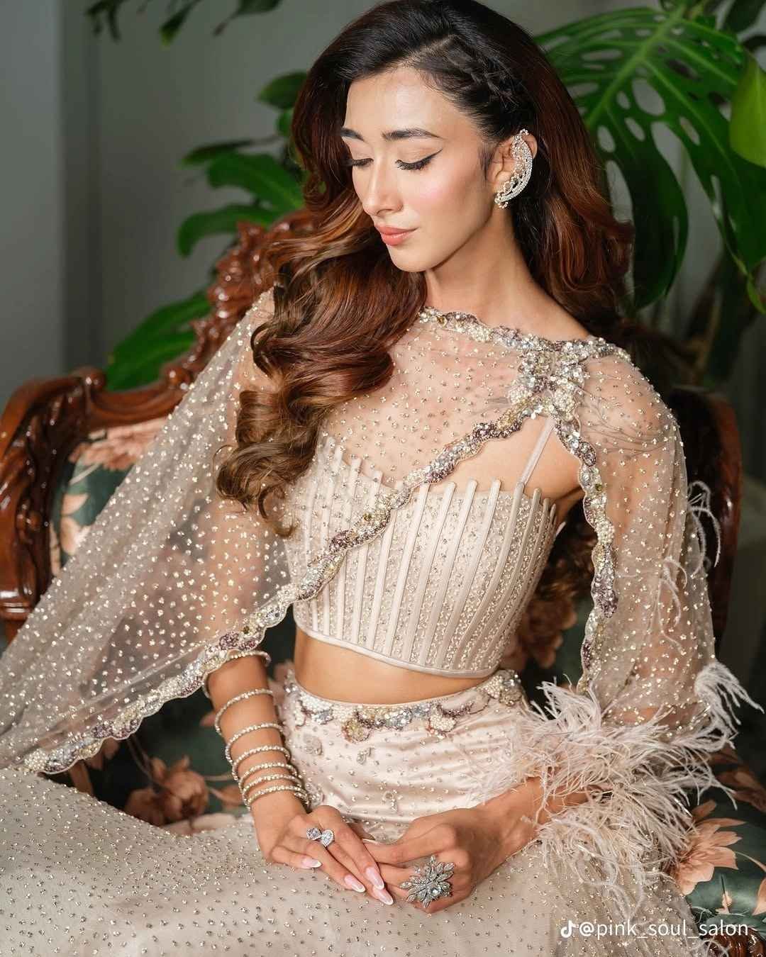 South Asian bridal makeup with soft glam eyes and voluminous hairstyle by Pink Soul