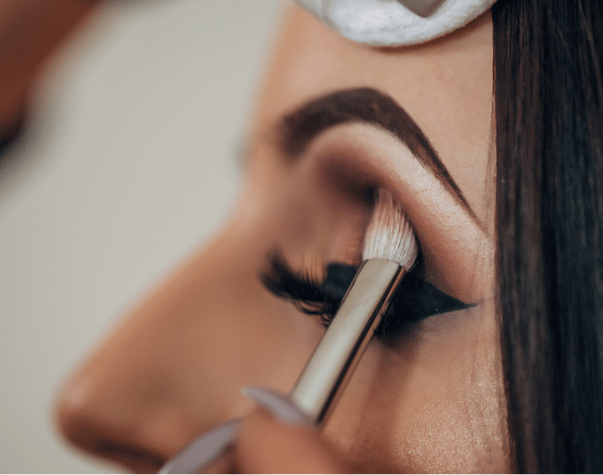 Middle Eastern makeup artist applying Arabic-inspired eye makeup